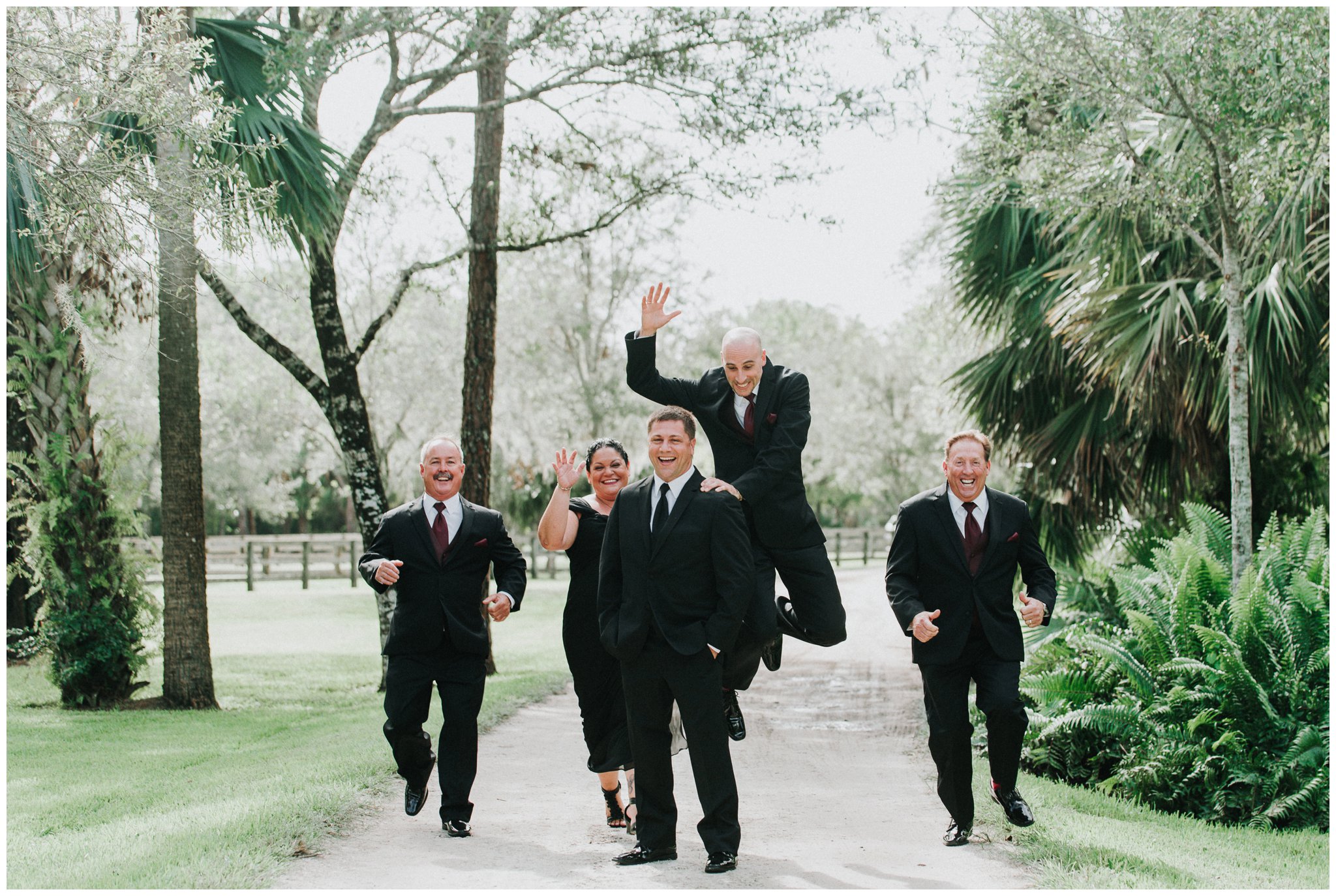 Leave it to the groom's party to have a photo like this! Don't you just love how much fun they are having?